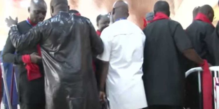 Minority MPs clad in red and black to protest suspension of MPs