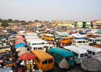 Commuters in Kumasi haggle over high transport fares with commercial drivers